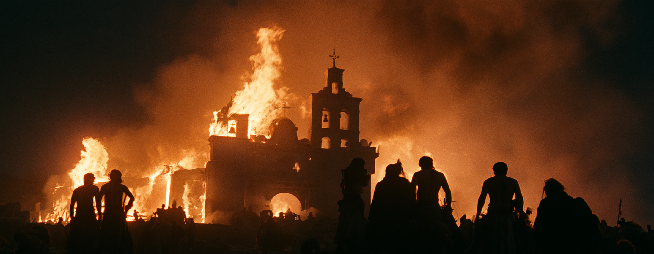 A mission burns at night, figures silhouetted.